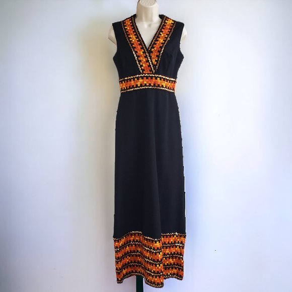 Vintage 70s black maxi dress with yellow/orange woven trim and gold sequins